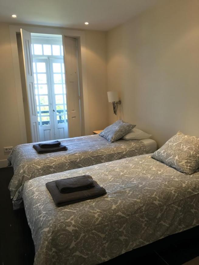 Quarto Twin com Chuveiro