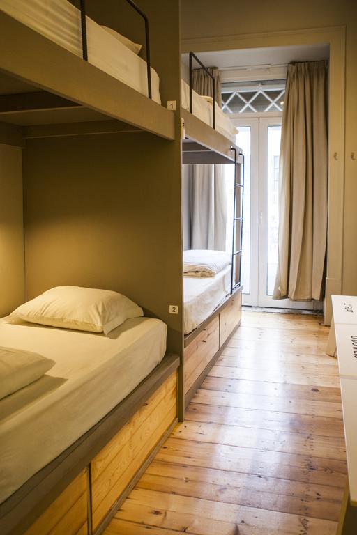 Posto letto in Dormitorio Misto da 4 Letti con Bagno in Comune