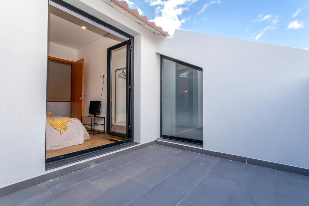 Quarto Duplo com Terraço