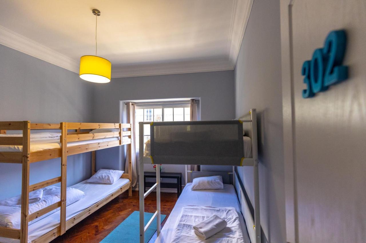 Quarto Quádruplo com Banheiro Compartilhado