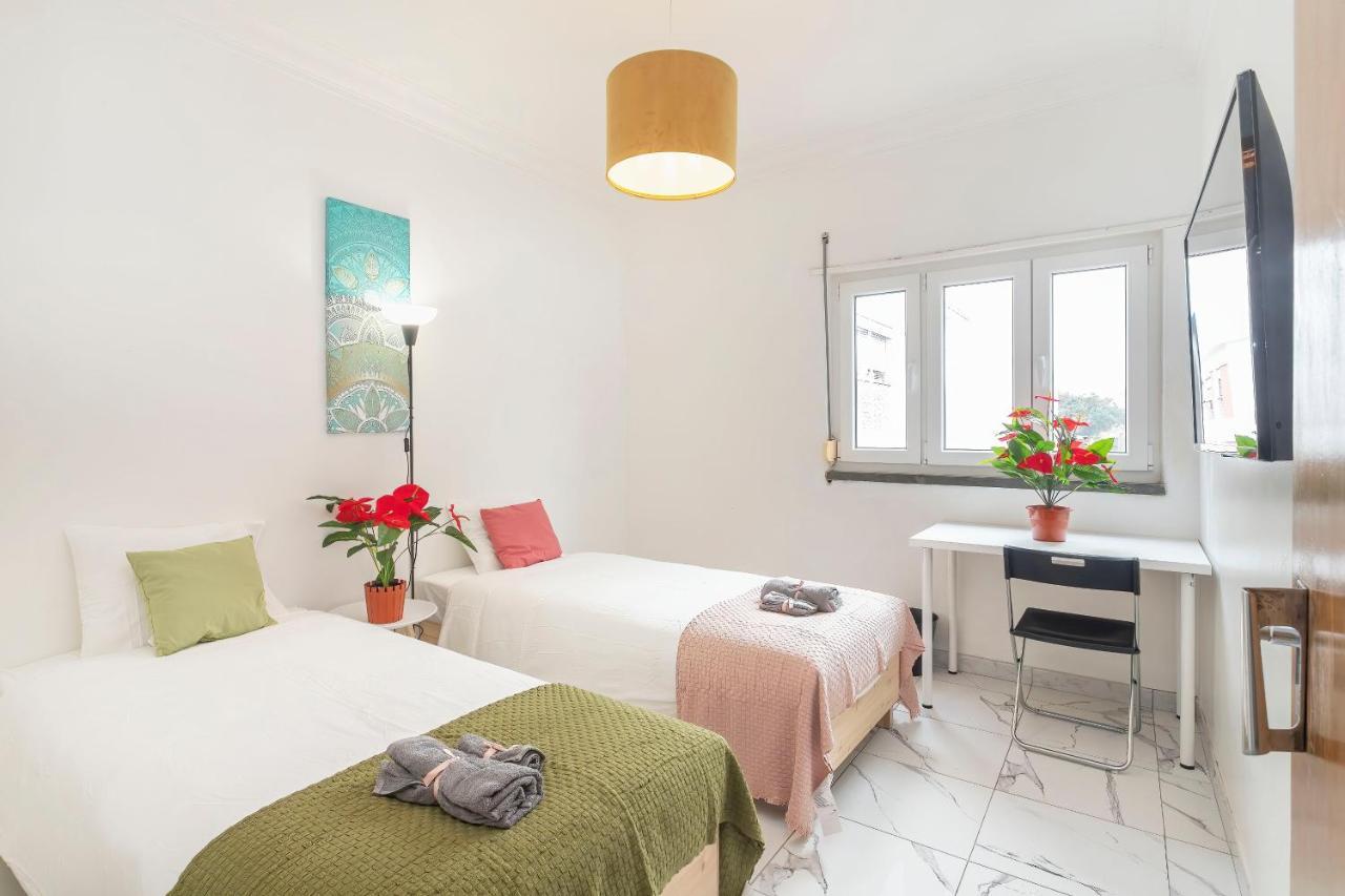 Quarto Twin com Casa de Banho Partilhada