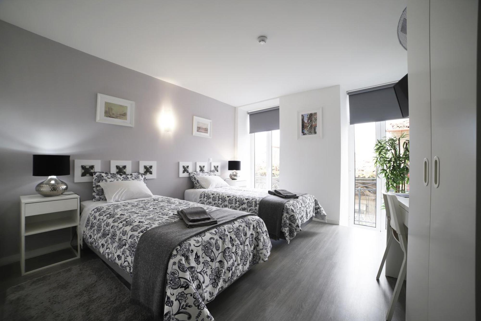 Tweepersoonskamer met 2 Aparte Bedden
