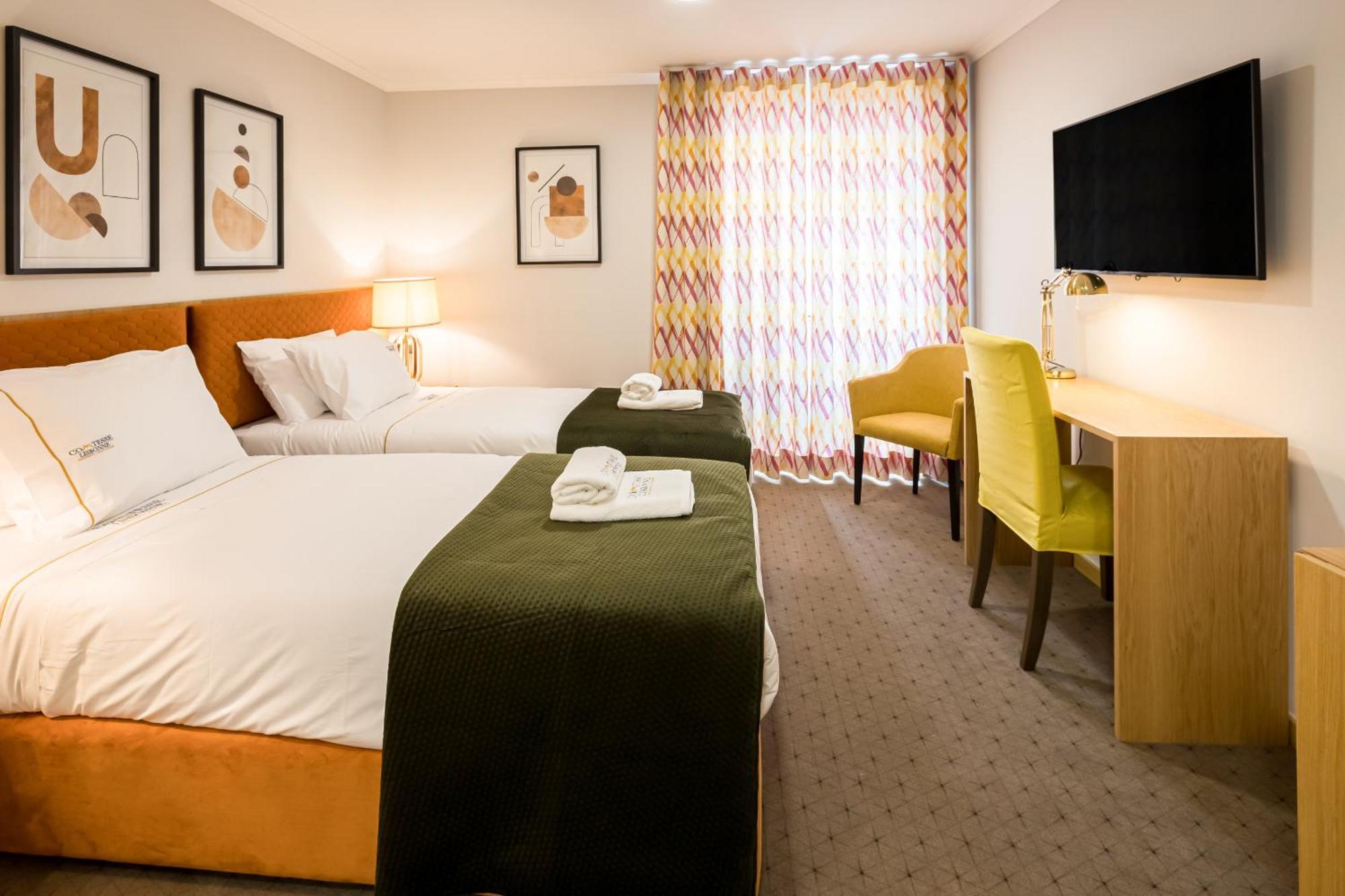 Quarto Deluxe com Cama de Casal ou 2 de Solteiro