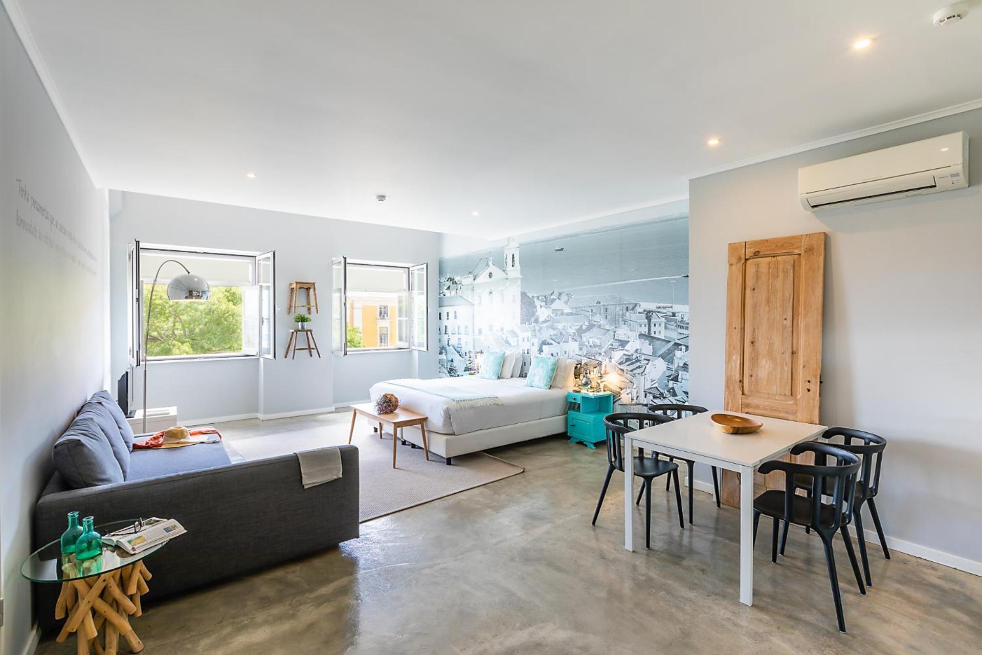 Suite Familiare con Angolo Cottura e Vista Fiume
