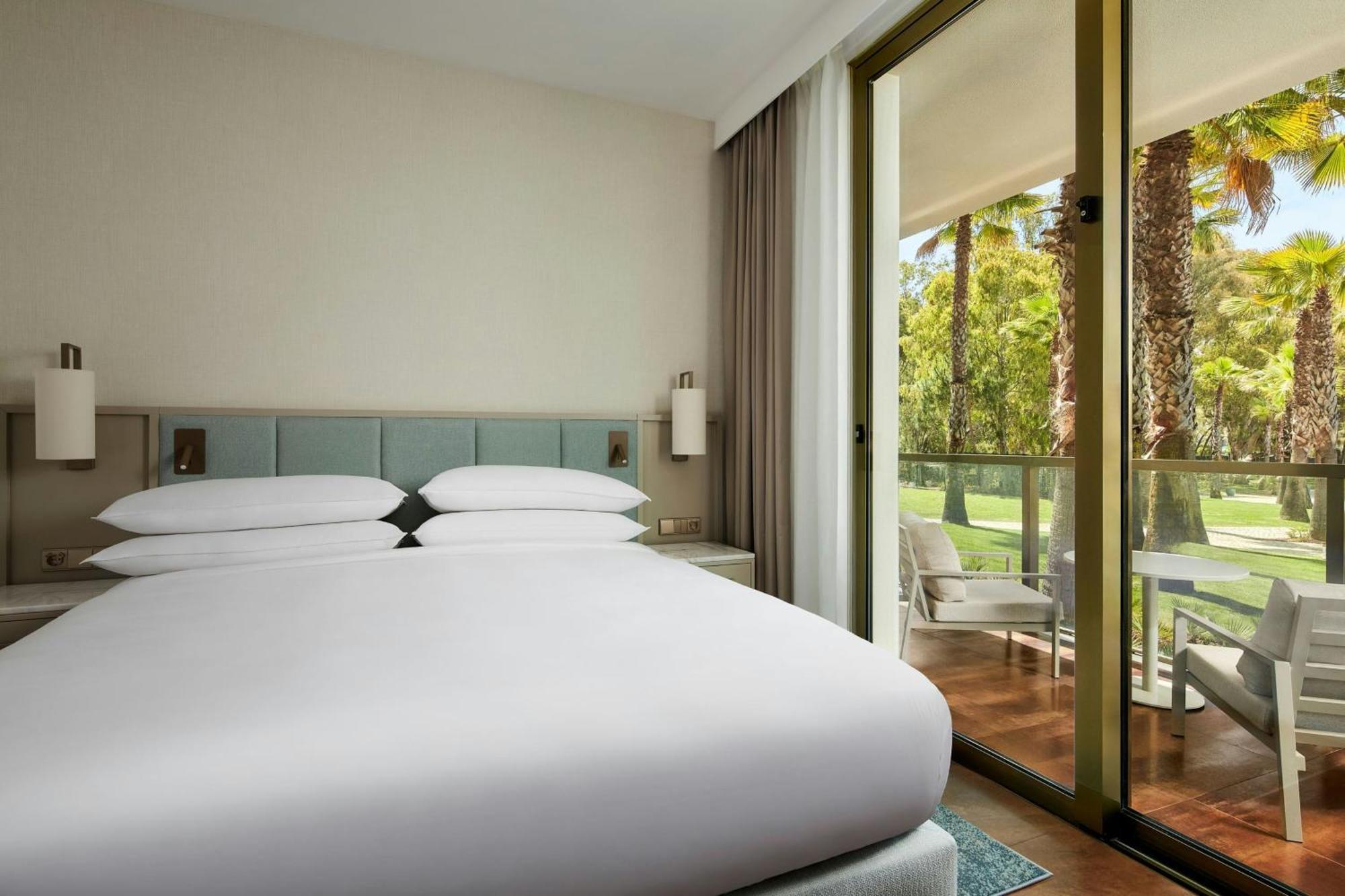 Three-Bedroom Suite Balcony Pool View