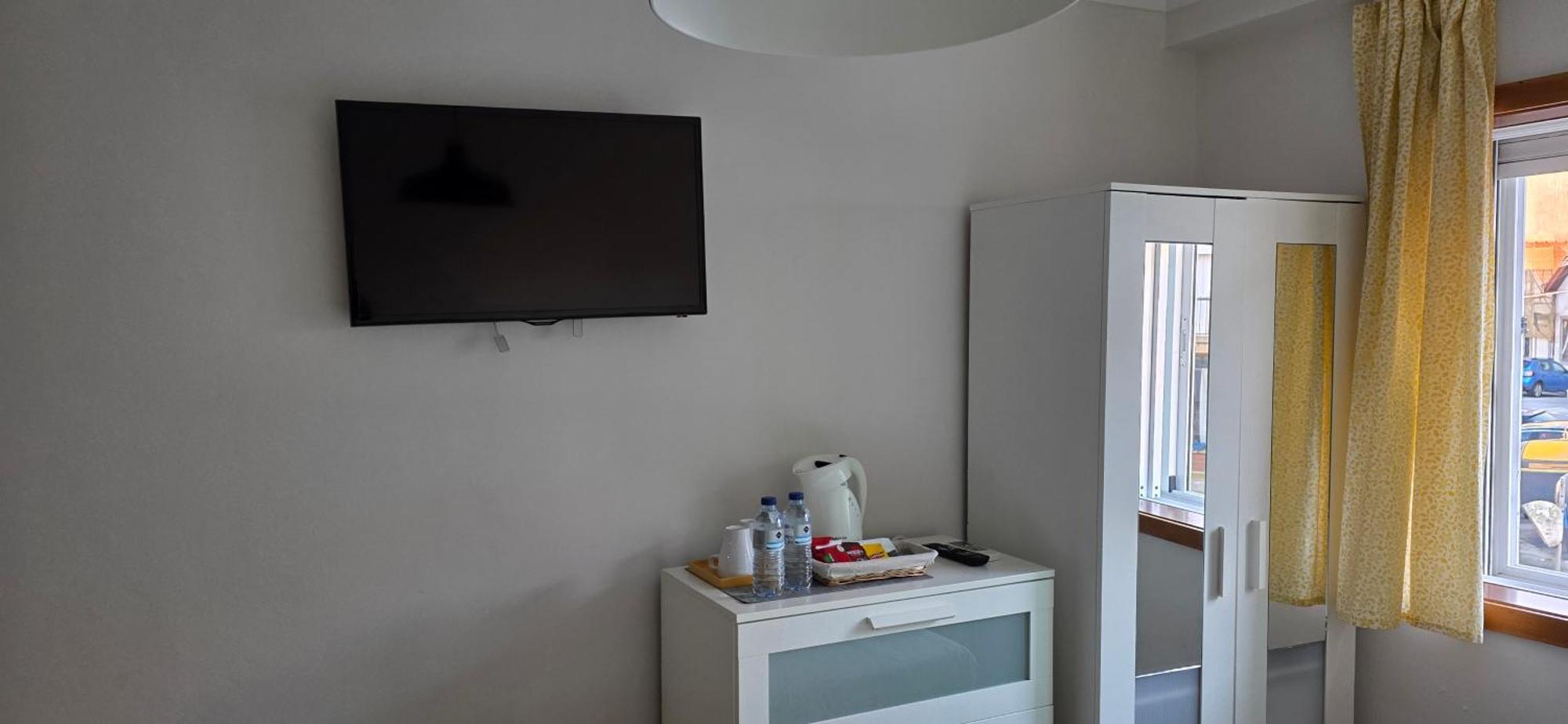 Quarto Triplo com Vista do Jardim