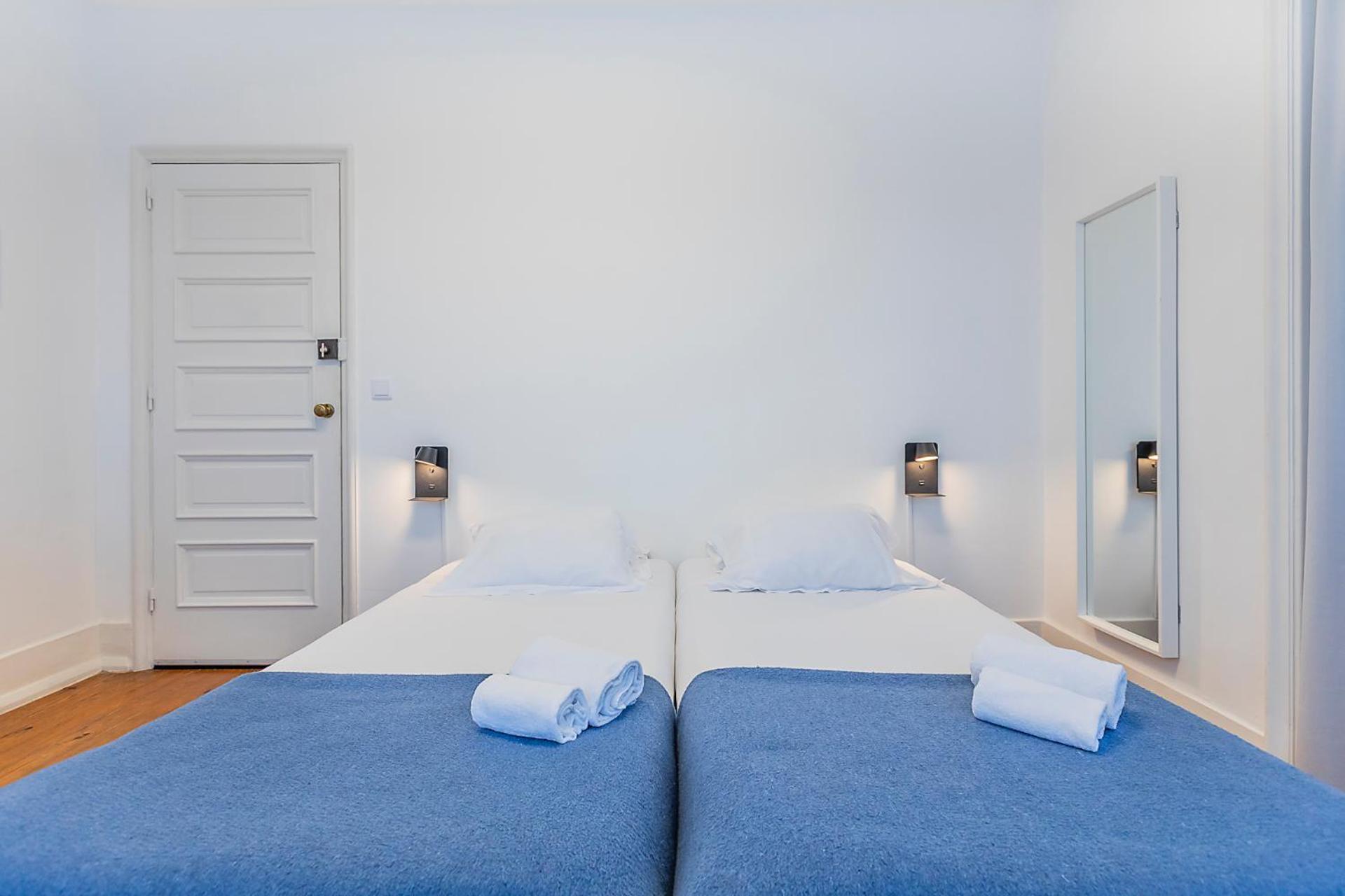 Quarto Twin com Casa de Banho Partilhada
