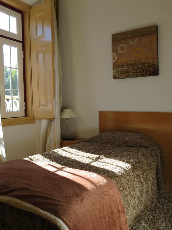 Quarto Individual com Casa de Banho Partilhada