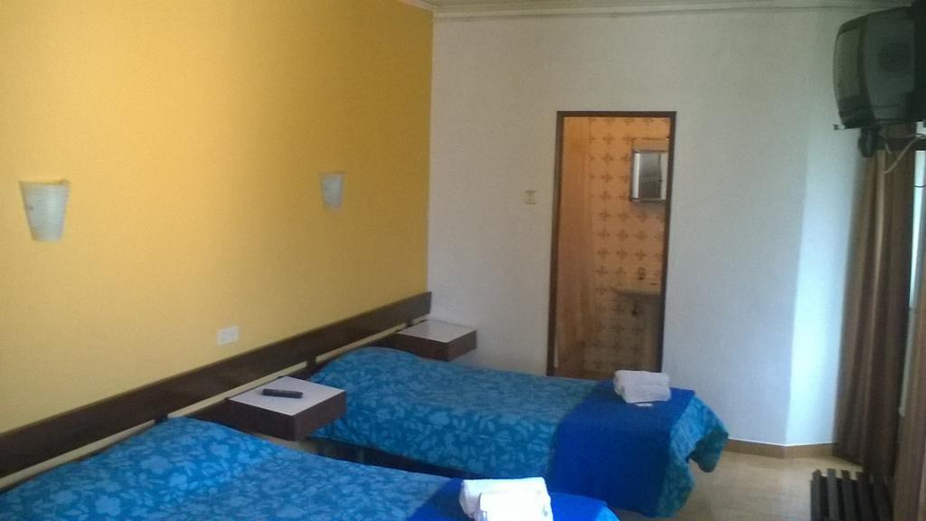 Quarto Triplo com Casa de Banho Privativa