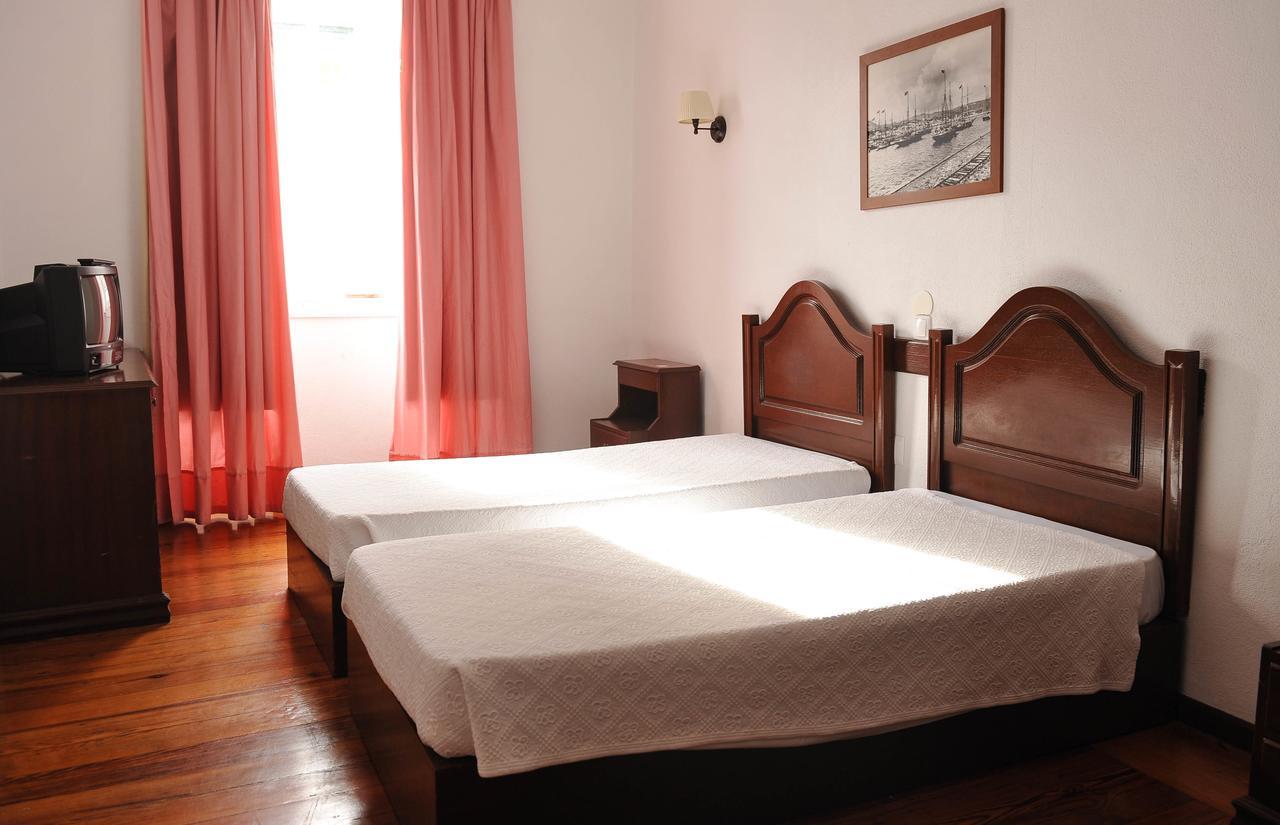 Quarto Twin Standard com Vista Jardim