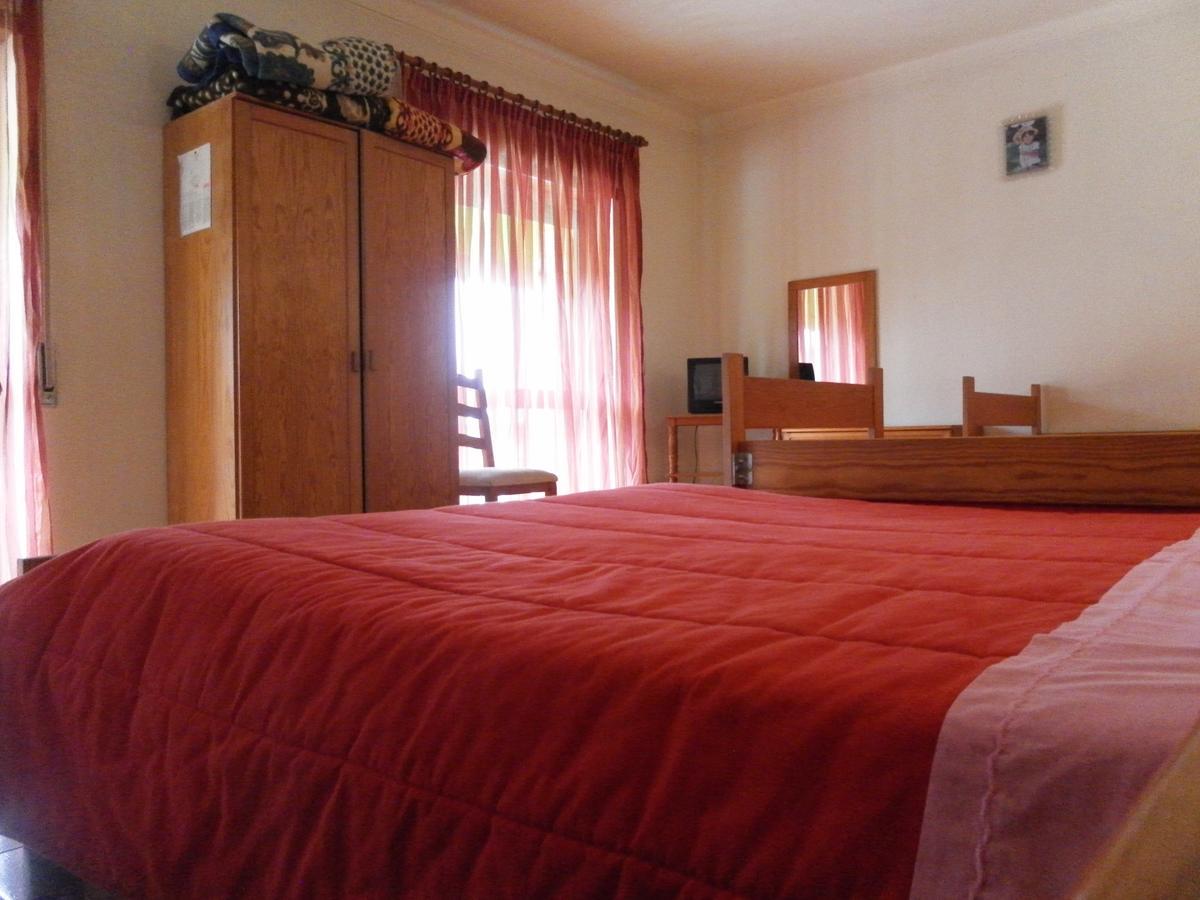 Quarto Triplo com Casa de Banho Privativa