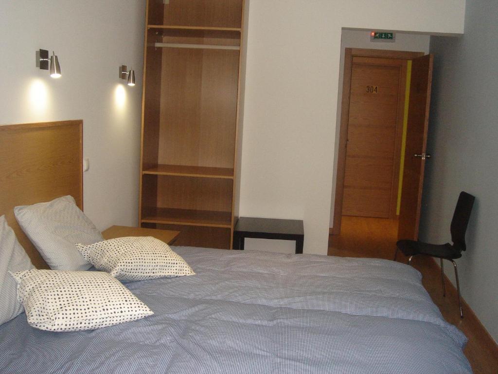 Quarto Twin com Casa de Banho Partilhada