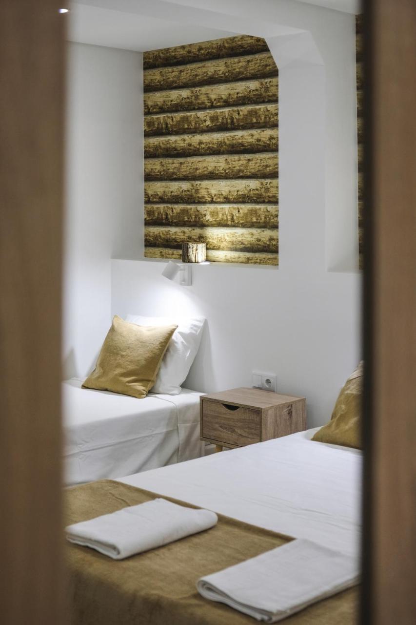 Quarto Quádruplo com Banheiro Compartilhado