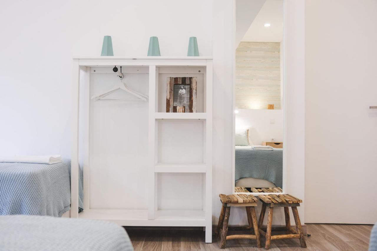 Quarto Quádruplo com Banheiro Compartilhado