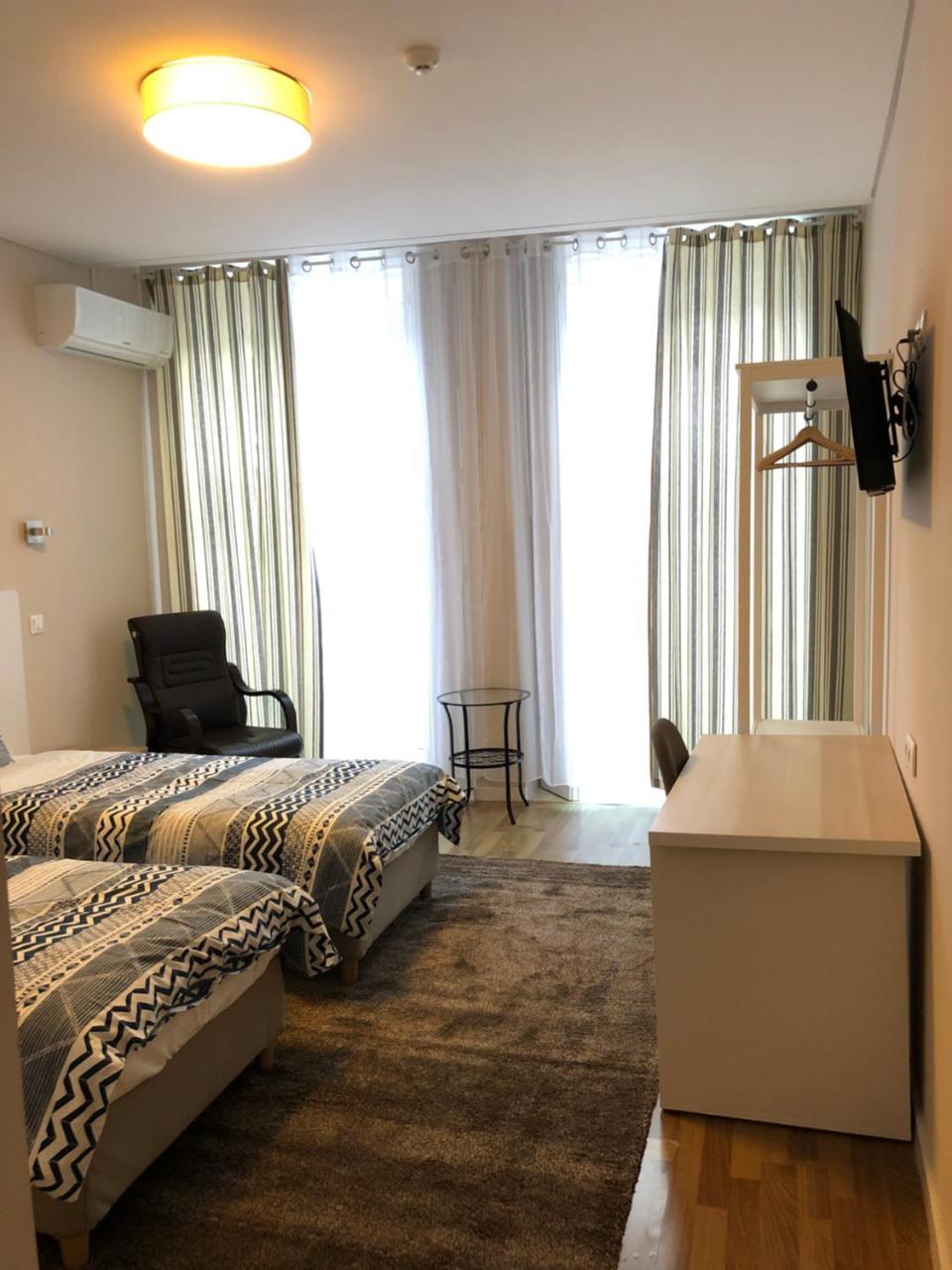 Doppel- oder Zweibettzimmer