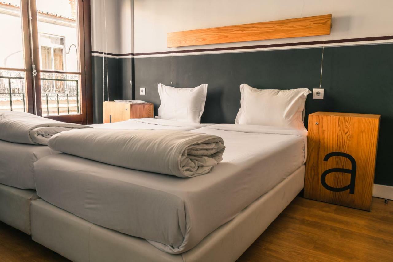 Cama Individual en habitación compartida femenina