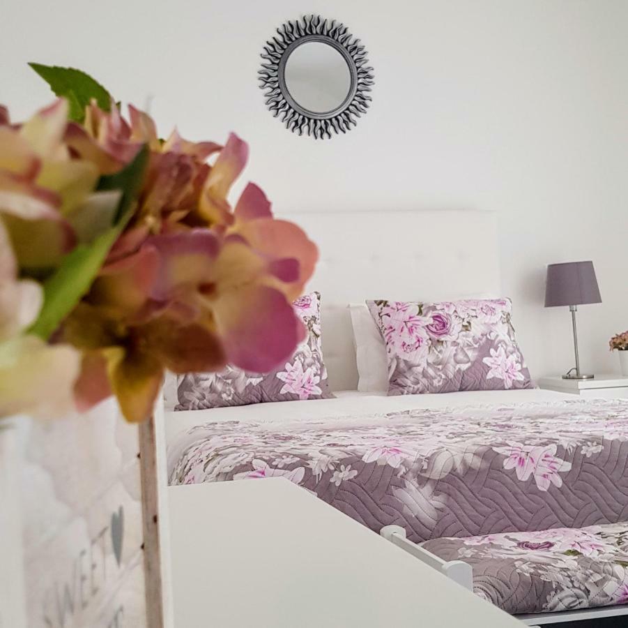 Quarto Duplo com Varanda (2 Adultos + 1 Criança)